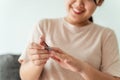 Woman cutting fingernails using nail clipper, Healthcare, Beauty Concept