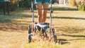 Woman cutting grass with lawnmower Royalty Free Stock Photo