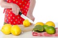 Woman cutting a lemon in half Royalty Free Stock Photo