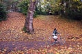 Woman cycles in the wood