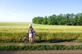Woman cycling countryside Royalty Free Stock Photo