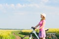Woman cycling countryside Royalty Free Stock Photo
