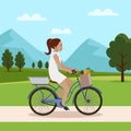 Woman cycling, fitness sport exercises. Person riding bicycle in forest park