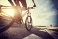 Woman cyclist legs riding Mountain Bike