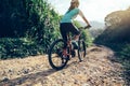 Cyclist riding a bike on a nature trail Royalty Free Stock Photo
