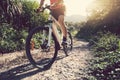 Cyclist riding a bike on a nature trail Royalty Free Stock Photo