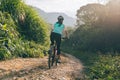 Cyclist riding a bike on a nature trail in the mountains