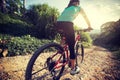 Cyclist riding a bike on a nature trail in the mountains Royalty Free Stock Photo