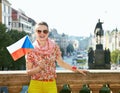Woman with Czech flag standing near National Museum in Prague Royalty Free Stock Photo