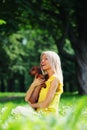 Woman dachshund in her arms