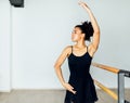 Woman in dancewear practicing hand moves Royalty Free Stock Photo