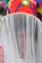 Woman dancing in the foreground, with a veil on her face, Carnival of Apurimac, Royalty Free Stock Photo