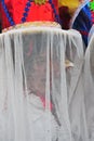 Woman dancing in the foreground, with a veil on her face, Carnival of Apurimac, Royalty Free Stock Photo