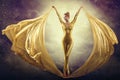 Woman dancing with golden flying Fabric. Perfect Gold Slim Body Silhouette. Fluttering Waving Silk Cloth as Butterfly Wings