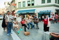 Woman dancing near the street musicians in Turkey