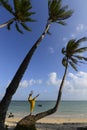 Woman dancing beside the seashore