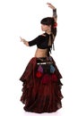 Woman dancing trible eastern belly dance. Back side.