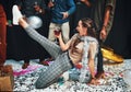 Woman, dancing and wine for celebration with friends on floor with confetti, alcohol and dance moves for new years Royalty Free Stock Photo