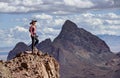 Woman Day Hiker On Desert Peak