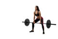 Woman deadlift craving with a barbell Royalty Free Stock Photo