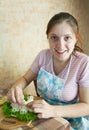 Woman is decorating stuffed eggs