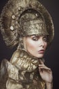 Woman in decorative kokoshnik head wear