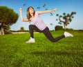 Woman defends herself from the attack of mosquitoes running fast