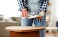 woman degreasing old table surface with solvent Royalty Free Stock Photo