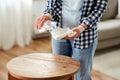 woman degreasing old table surface with solvent Royalty Free Stock Photo