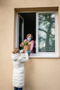 Woman delivering groceries for senior woman Royalty Free Stock Photo