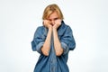 Woman in denim jeans shirt r hiding her face. She wants to stay anonym. Royalty Free Stock Photo