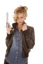 Woman denim shirt black jacket gun up Royalty Free Stock Photo