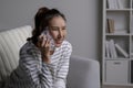 Woman with dental problems uses a cold pack on her cheek to relieve a toothache Royalty Free Stock Photo