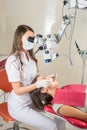 Woman dentist in her office treating female patient Royalty Free Stock Photo