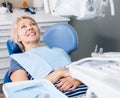 Woman in dentist office waiting for procedure Royalty Free Stock Photo