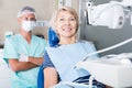 Woman in dentist office waiting for procedure Royalty Free Stock Photo