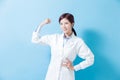 Woman dentist show strong arm Royalty Free Stock Photo