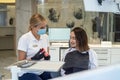 dentist shows on model of the jaw how to properly brush the teeth with a toothbrush Royalty Free Stock Photo