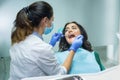 Woman at the dentist.