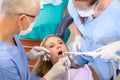 Woman at dentist surgery have treatment