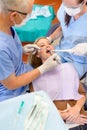 Woman at dentist surgery have treatment