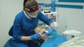 Woman at the dentist treats a teeth