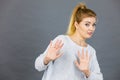 Woman deny something showing stop gesture with hands Royalty Free Stock Photo