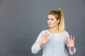 Woman deny something showing stop gesture with hands Royalty Free Stock Photo