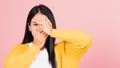 Woman in depressed bad mood covering face with hands Royalty Free Stock Photo