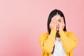 Woman in depressed bad mood covering face with hands Royalty Free Stock Photo