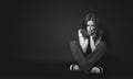 Woman in depression and despair crying on black dark Royalty Free Stock Photo