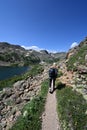 Woman descending King Lake Trail in Indian Peaks Wilderness, Colorado. Royalty Free Stock Photo