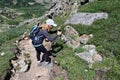 Woman descending King Lake Trail in Indian Peaks Wilderness, Colorado. Royalty Free Stock Photo