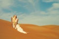 Woman and desert. UAE Royalty Free Stock Photo